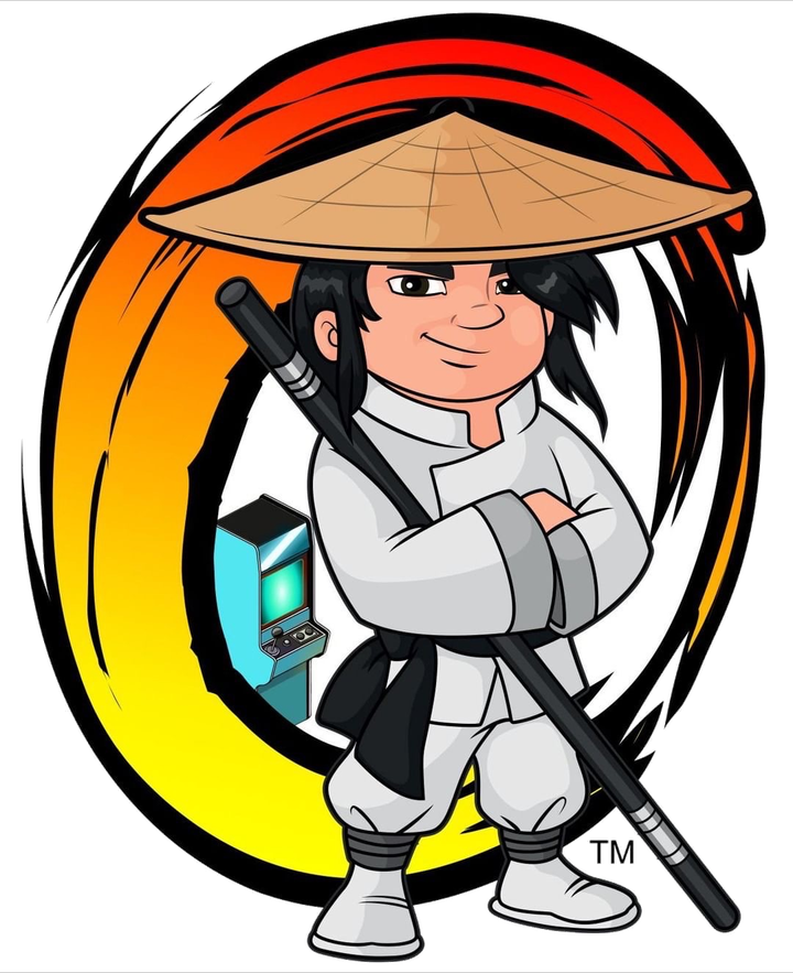 The Orlandu's Arcade mascot — a wandering warrior with a staff and an arcade cabinet on his back