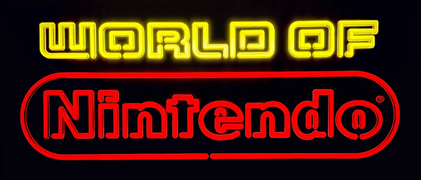 World of Nintendo Superbrite sign lit head on, yellow World of over the red Nintendo oval