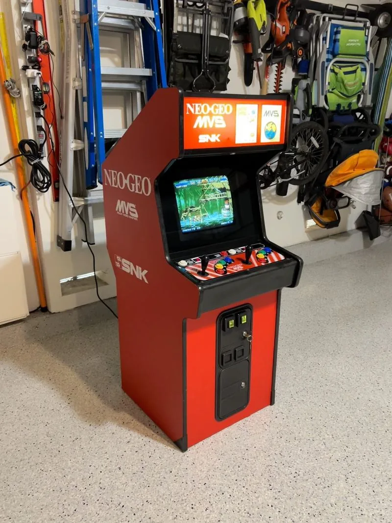 Red SNK Neo Geo MVS arcade cabinet running Metal Slug