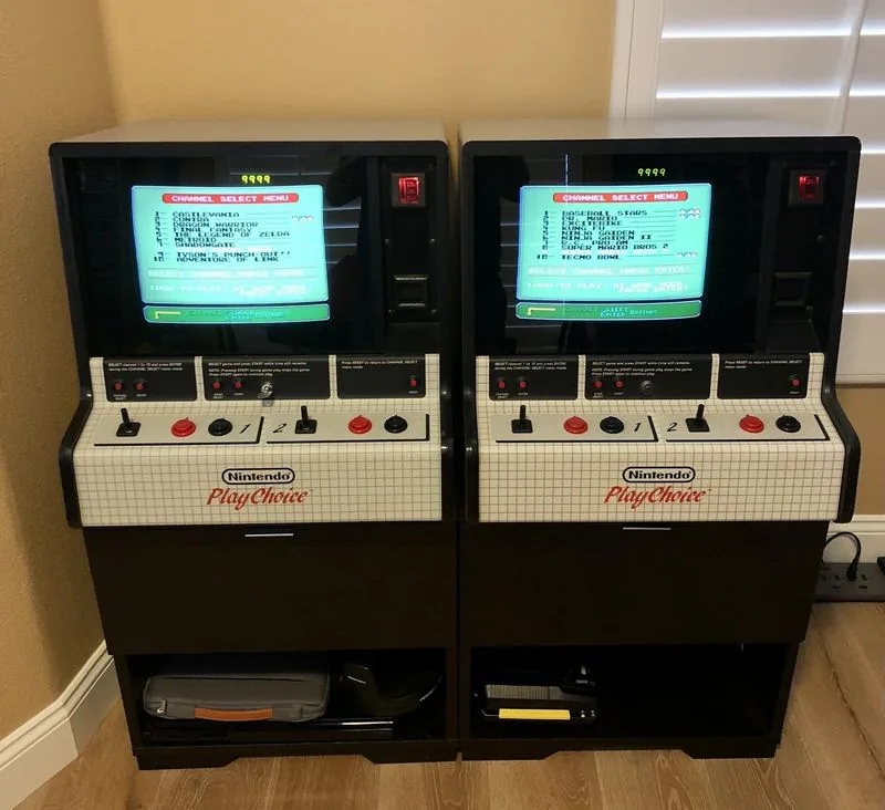 Two Nintendo PlayChoice counter-top units showing their channel select menus