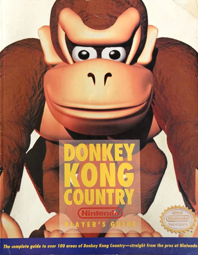 Cover of the Nintendo Player's Guide for Donkey Kong Country, a rendered gorilla filling the frame