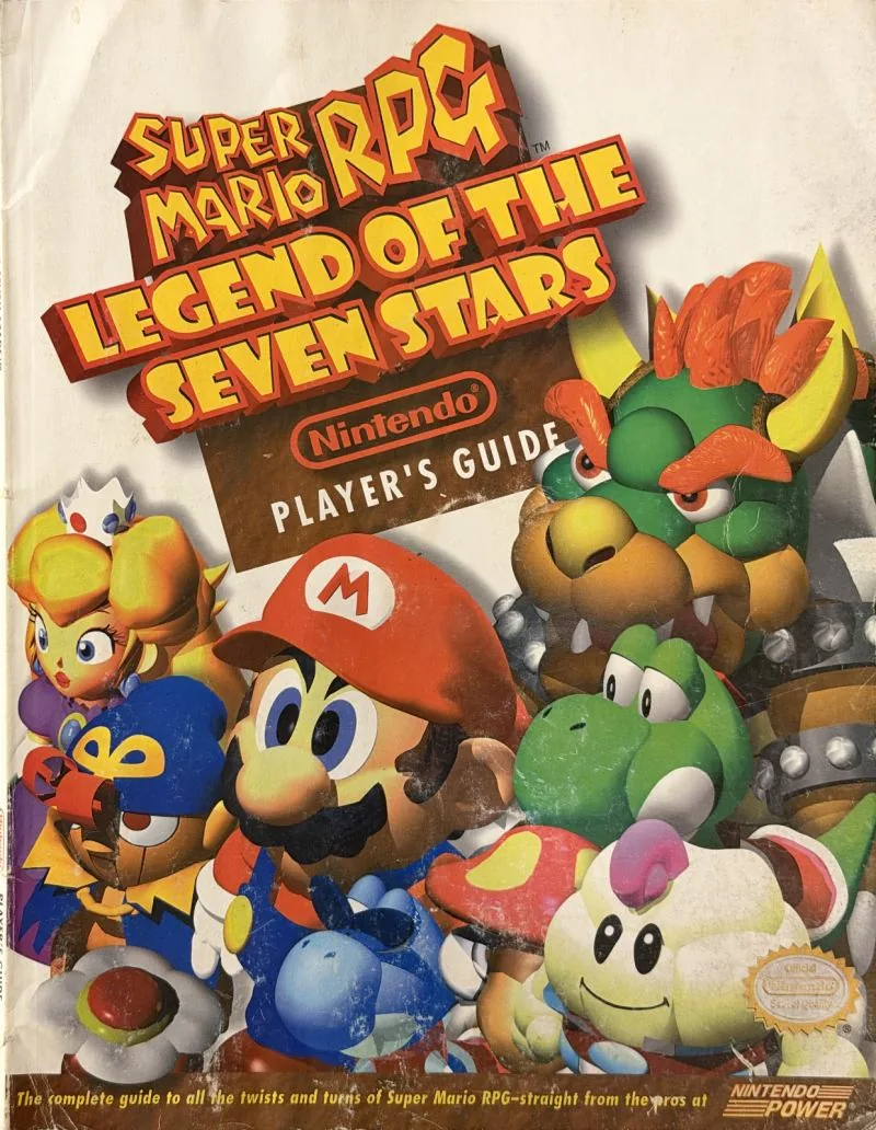 Cover of the Nintendo Player's Guide for Super Mario RPG, the pre-rendered cast crowded together