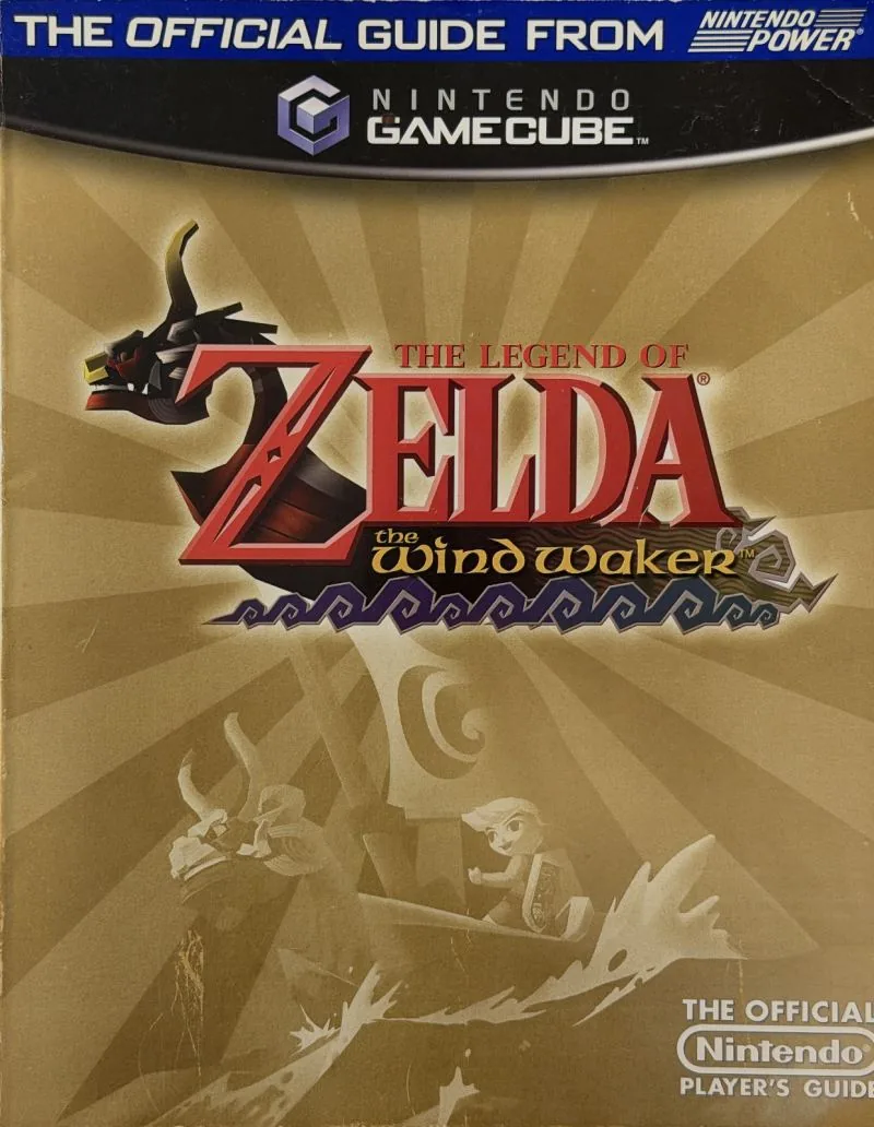 Cover of the Nintendo Player's Guide for The Legend of Zelda: The Wind Waker, gold cover with cel-shaded art behind the logo