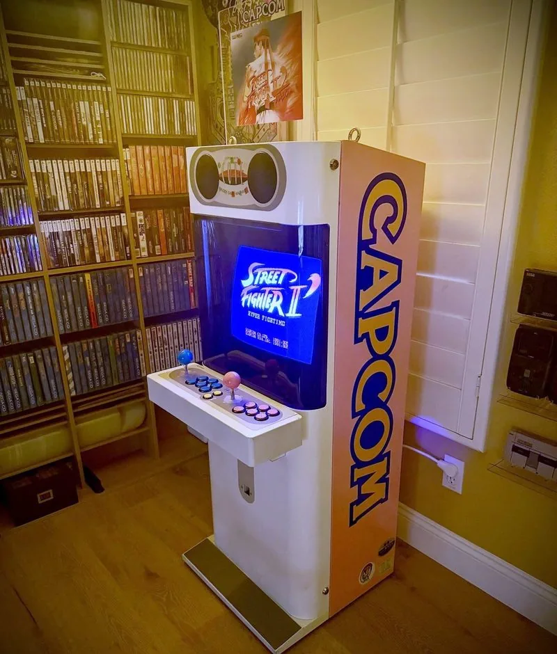 The Mini Cute from the side showing the full-height CAPCOM side art, Street Fighter II on the screen