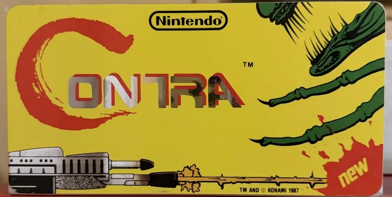 Original Nintendo PlayChoice-10 arcade topper for Contra
