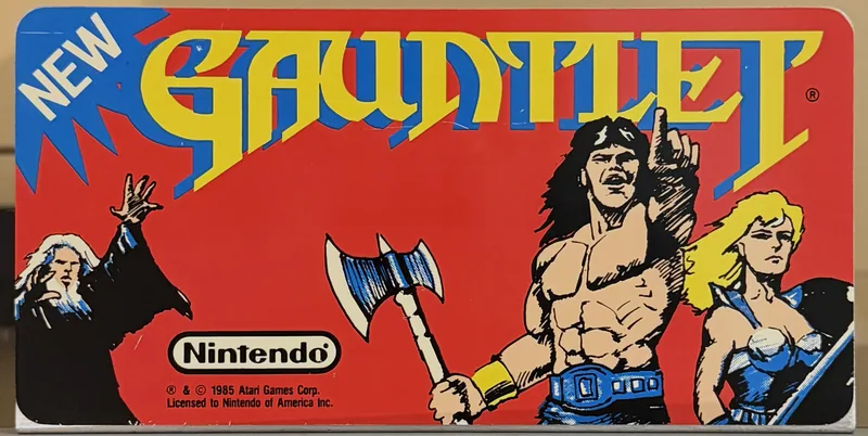 Original Nintendo PlayChoice-10 arcade topper for Gauntlet, the warrior, valkyrie and wizard on red