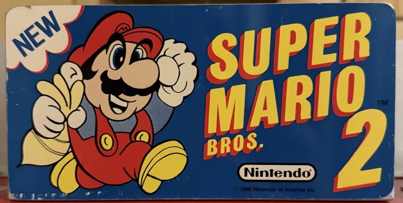 Original Nintendo PlayChoice-10 arcade topper for Super Mario Bros. 2