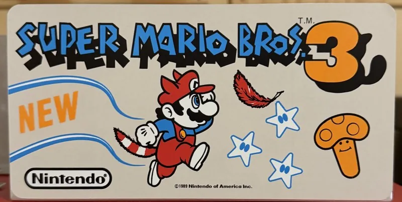 Original Nintendo PlayChoice-10 arcade topper for Super Mario Bros. 3