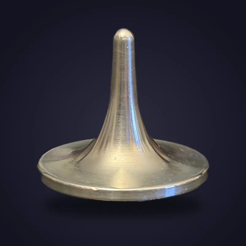 Foreverspin Aluminum spinning top, photographed off its base