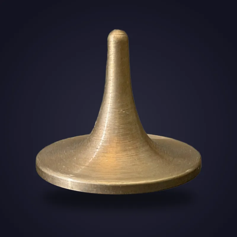 Foreverspin Arch Bronze spinning top, photographed off its base