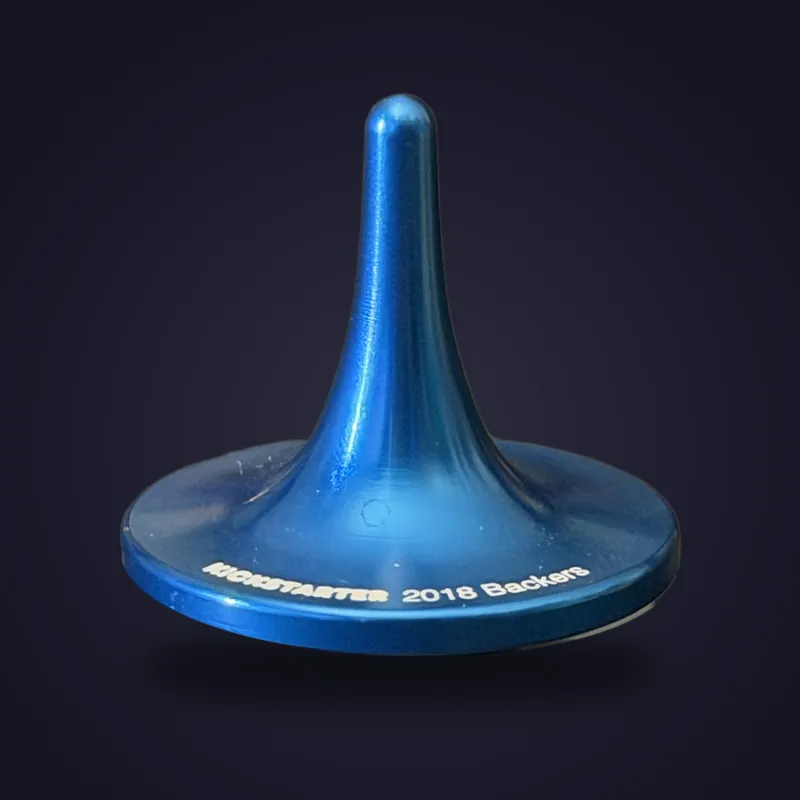 Foreverspin Blue spinning top, 2018 kickstarter backer, photographed off its base