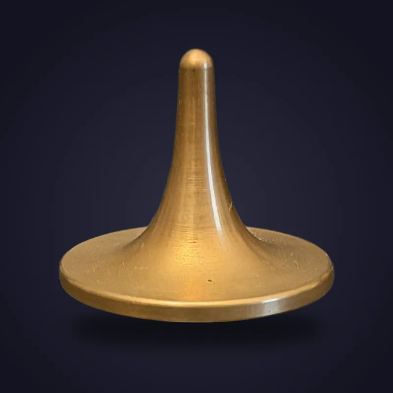 Foreverspin Bronze spinning top, photographed off its base