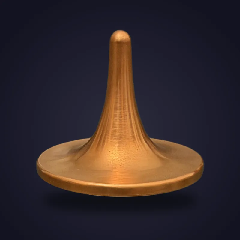 Foreverspin Copper spinning top, photographed off its base