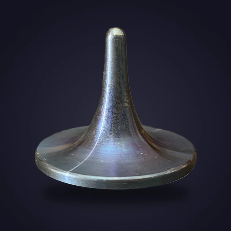 Foreverspin Founder's Edition (Blue-Gray) spinning top, photographed off its base