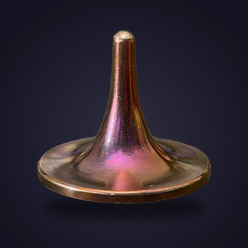 Foreverspin Founder's Edition (Purple-Bronze) spinning top, photographed off its base