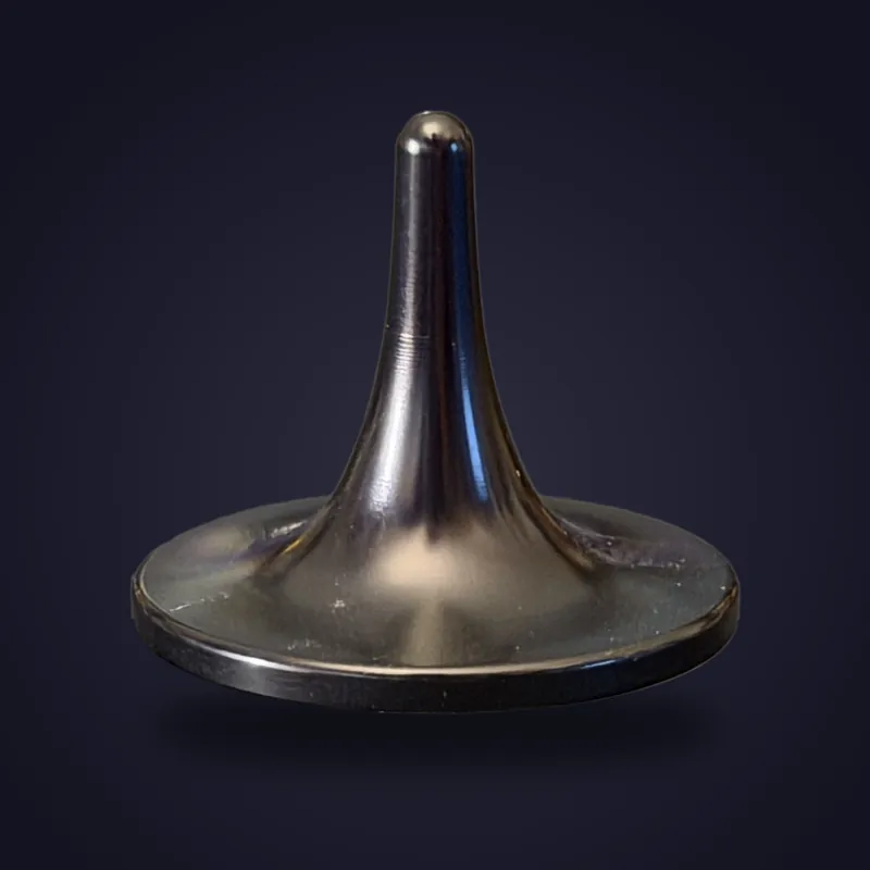 Foreverspin Gloss Black spinning top, limited edition, photographed off its base