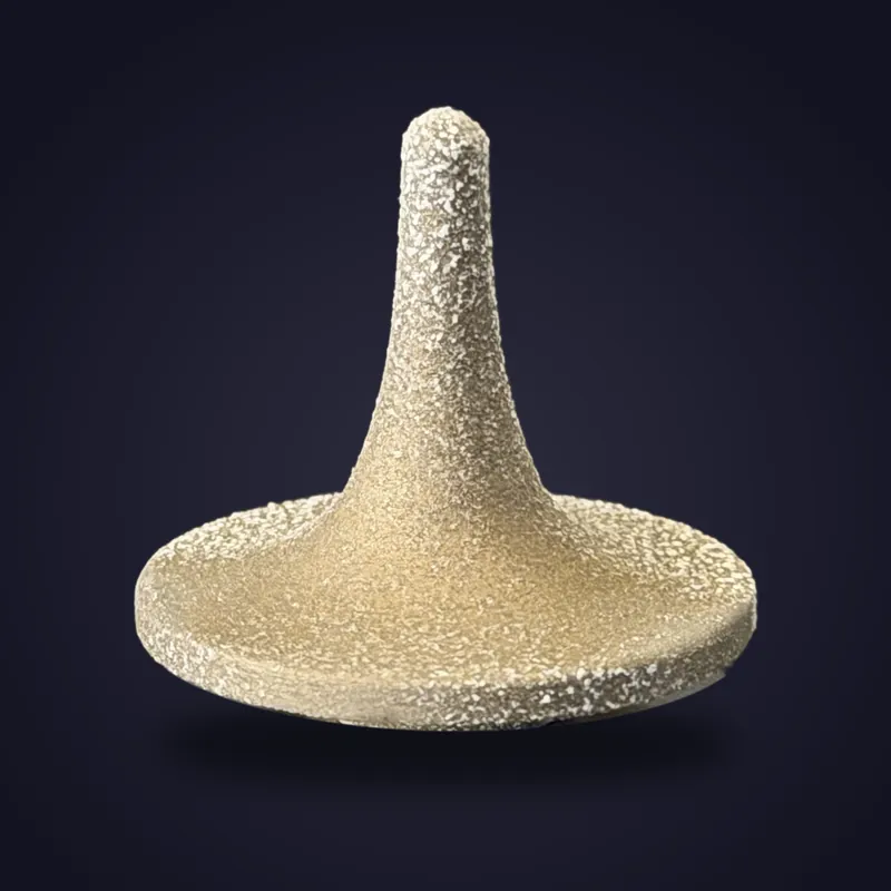 Foreverspin Magnesium spinning top, photographed off its base