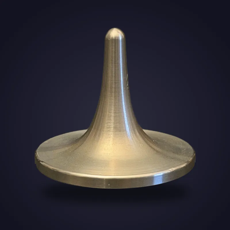 Foreverspin Nickel spinning top, photographed off its base