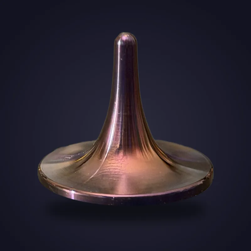 Foreverspin Purple Heat-Tinted spinning top, mystery top, photographed off its base