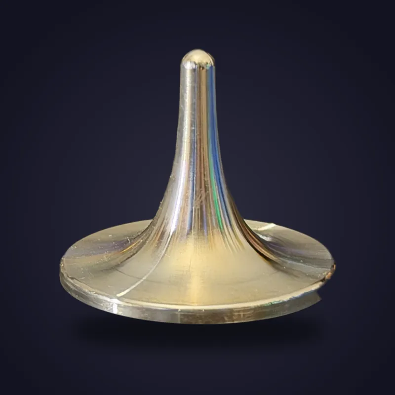 Foreverspin Silver spinning top, photographed off its base