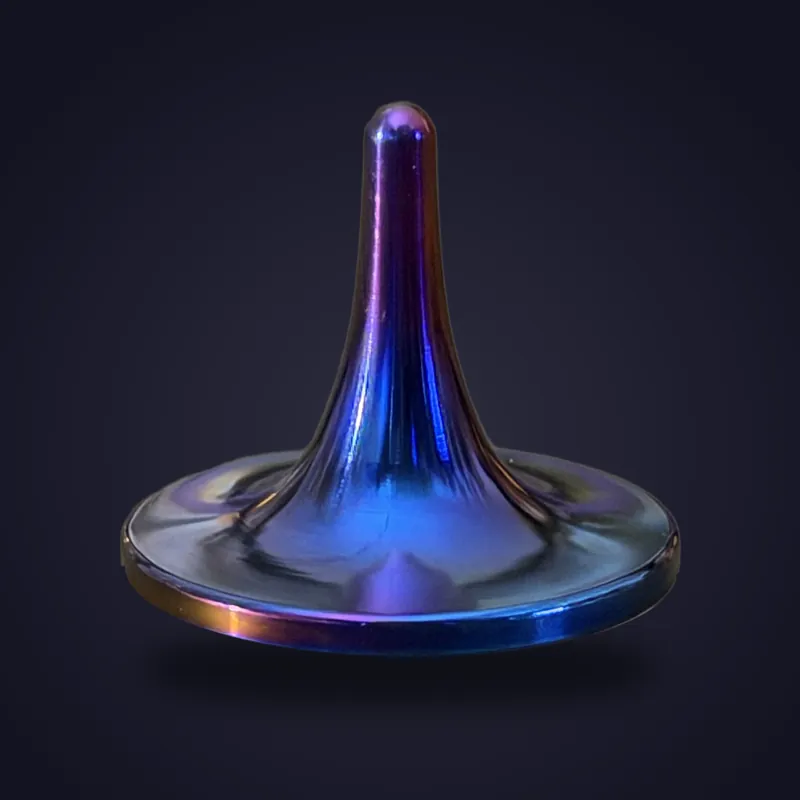 Foreverspin Titanium Founder's Edition spinning top, photographed off its base