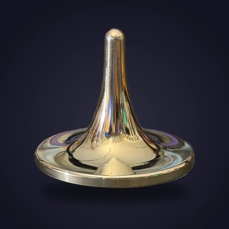 Foreverspin Titanium Mirror spinning top, photographed off its base