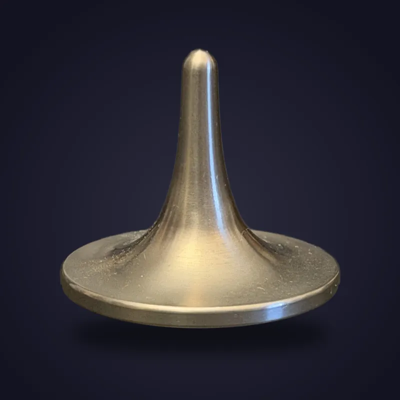 Foreverspin Zirconium spinning top, photographed off its base