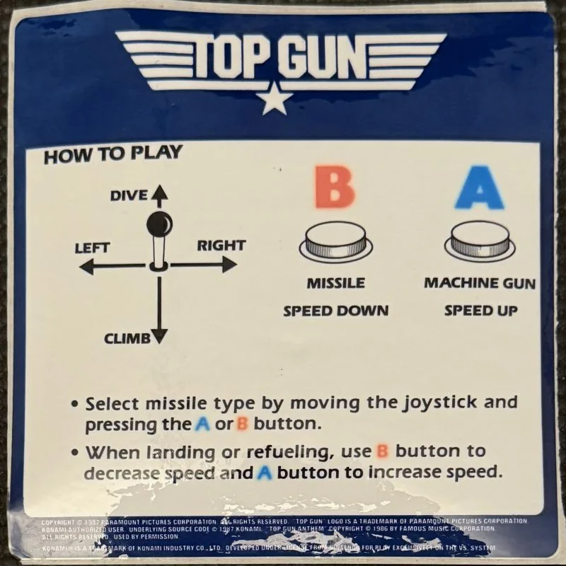 Nintendo VS. Top Gun instruction card, navy and white, with dive and climb joystick diagram